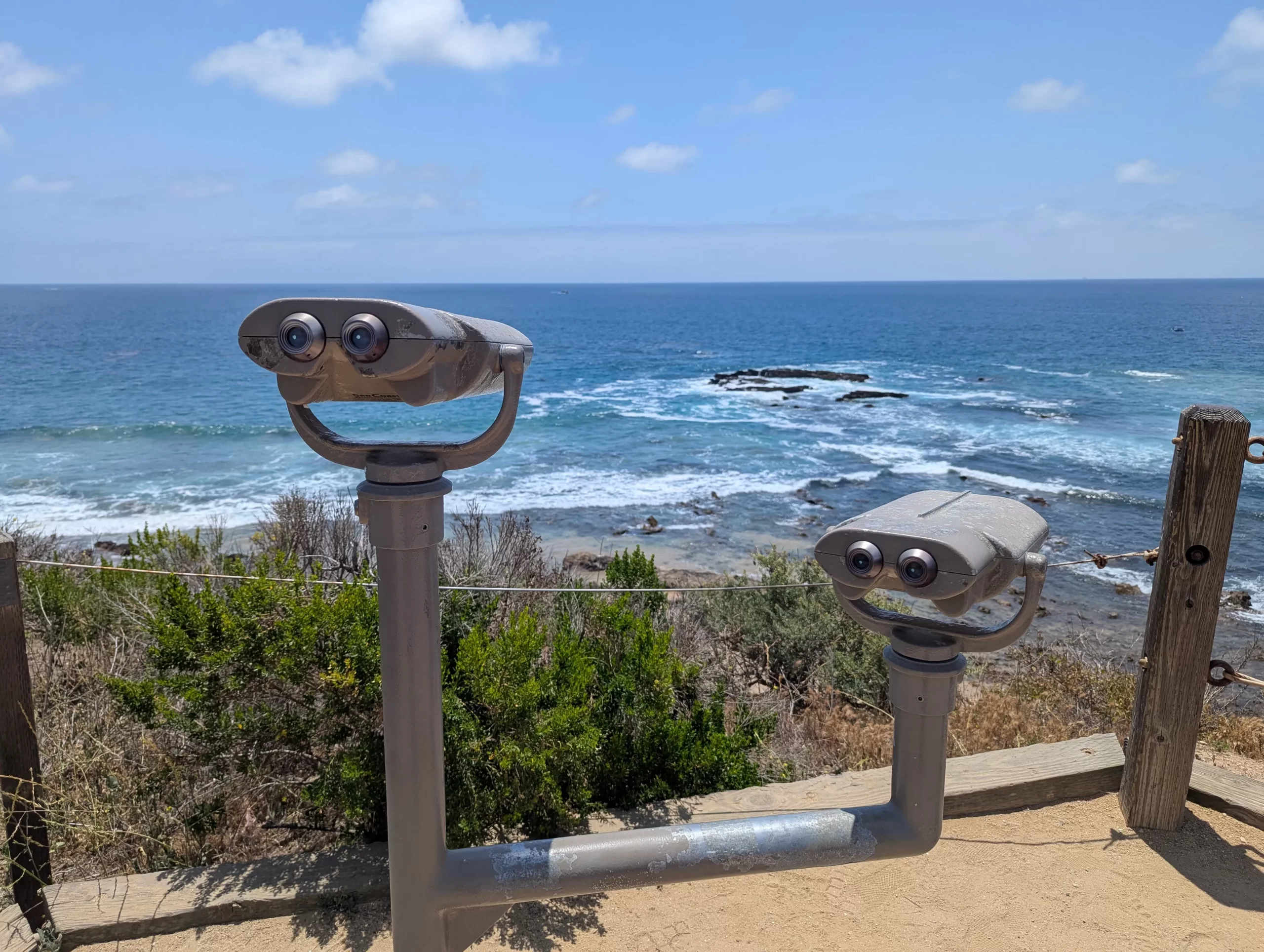 Viewfinders overlooking a cliff into the ocean