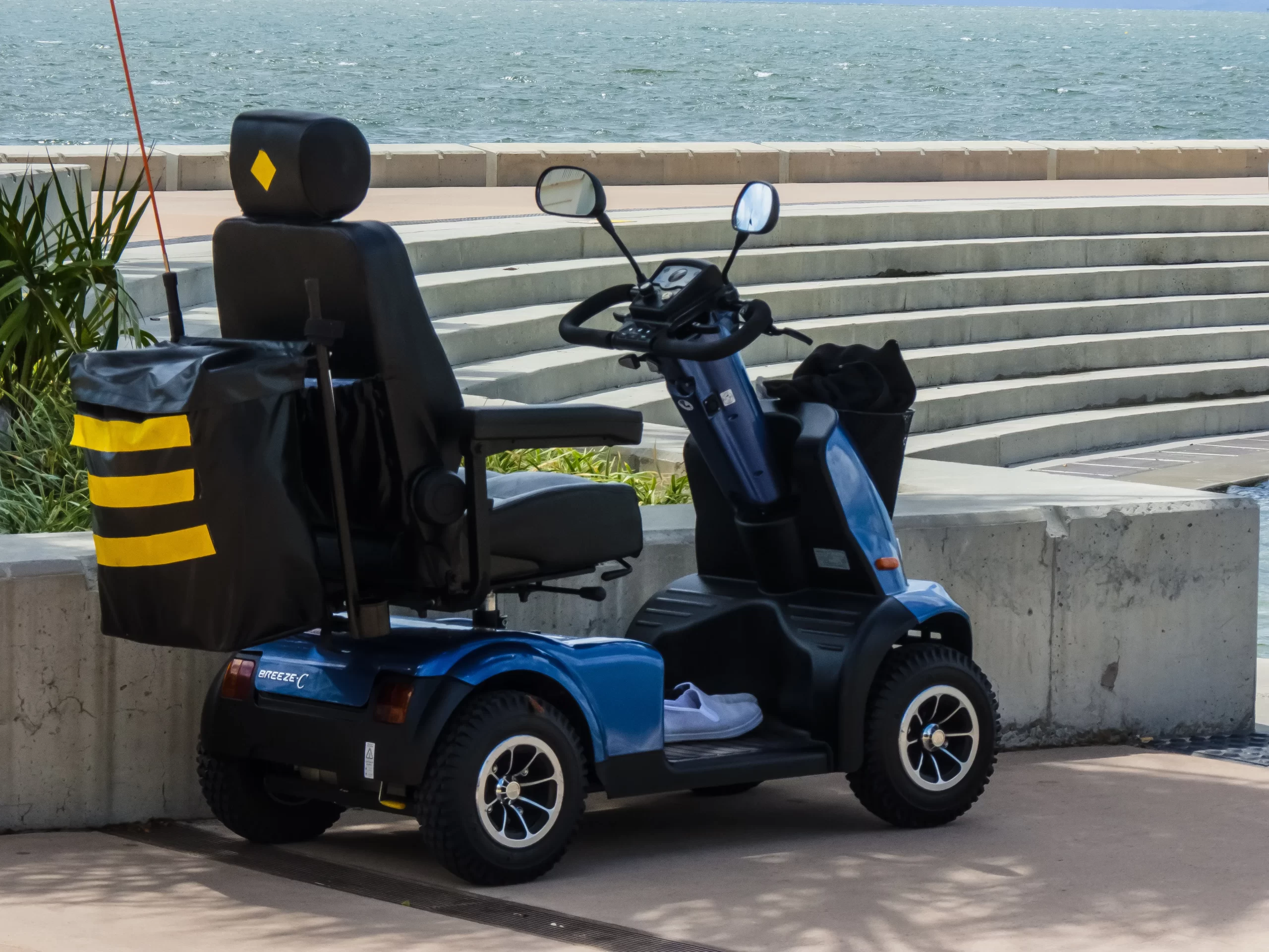 Mobility Scooter parked along the water